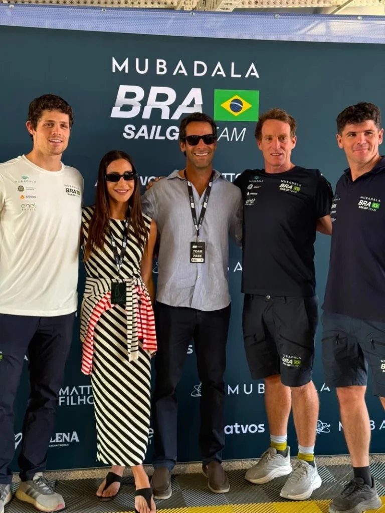 Carol Buffara e Pippo Garnero visitam os bastidores da equipe brasileira de SailGP durante a etapa de Portsmouth, na Inglaterra.